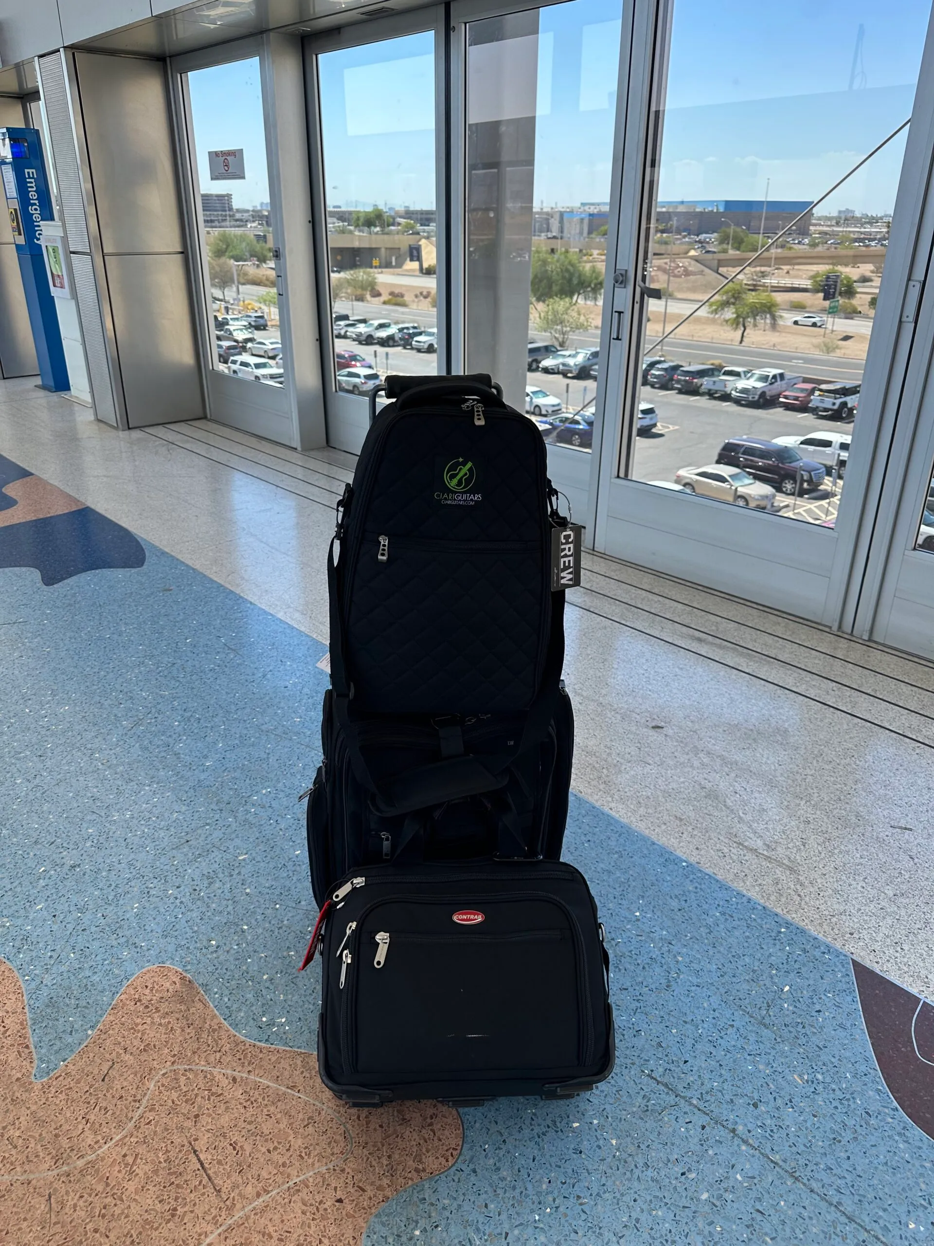 Flight kit, luggage, and my Ciari Ascender guitar.
